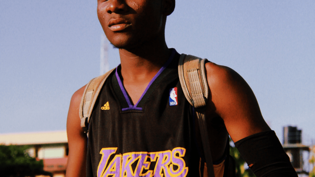 A person holding a basketball