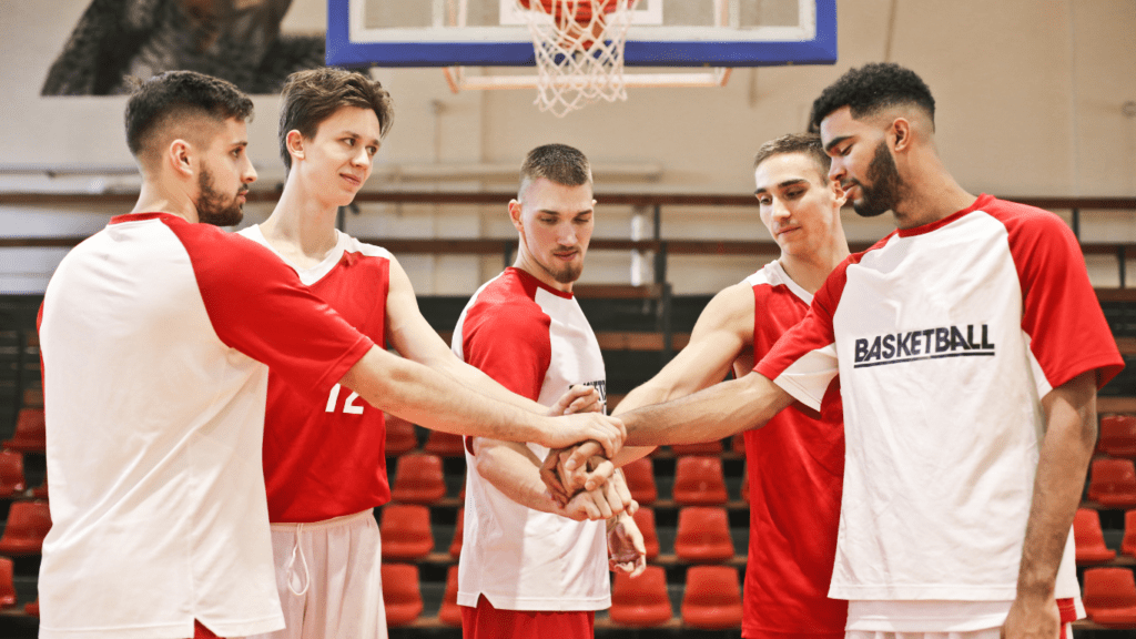 group of men playing basketball