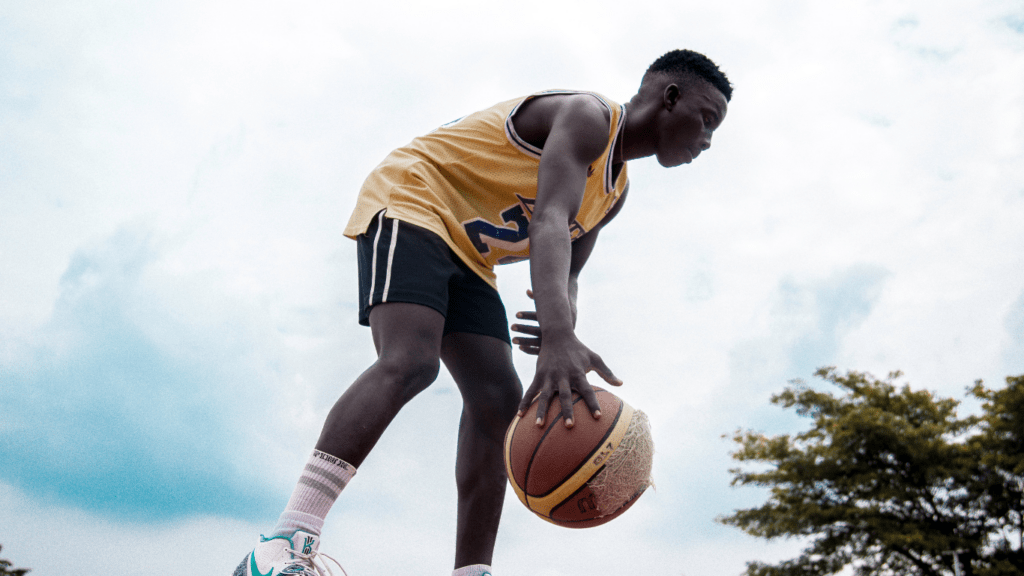 A person holding a basketball