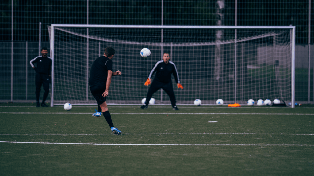 soccer players in action on a soccer field