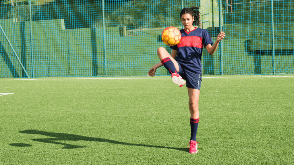 a person kicking a ball