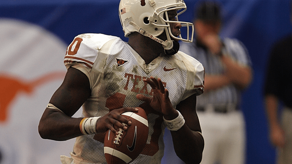 a football player throwing the ball during a game