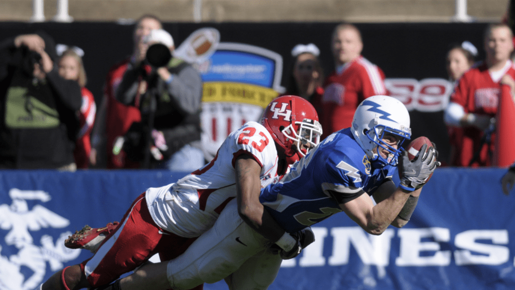 a philadelphia eagles football player is tackled by another player